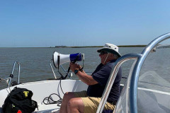James Robinson in the Dixon Committee Boat “Gatsoing” speeding RIBs
